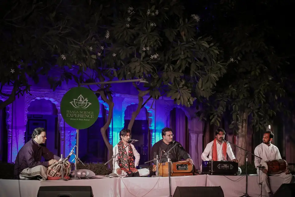 Singers and harmonium on the main stage