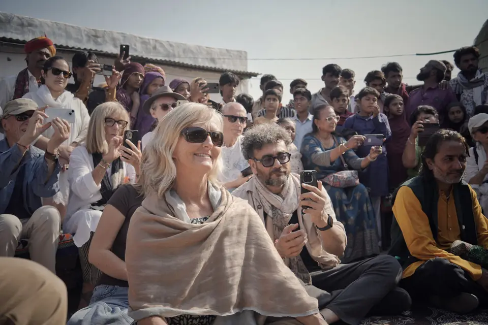 Guests smiling in the crowd