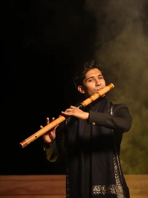 Shaizan Khan playing bansuri
